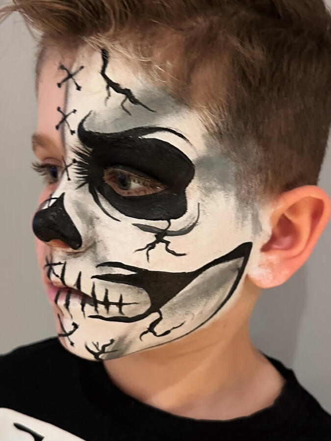 Half face skull face paint for Halloween Events