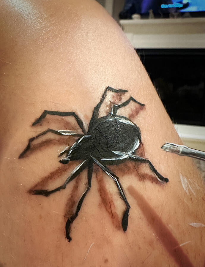 Realistic Spider painted on leg